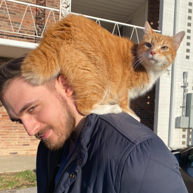 Me and my cat Pizza, rest his soul Me and my cat Pizza, rest his soul